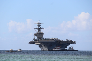 The USS Abraham Lincoln, seen from U.S. Naval Base Guam in December 2025